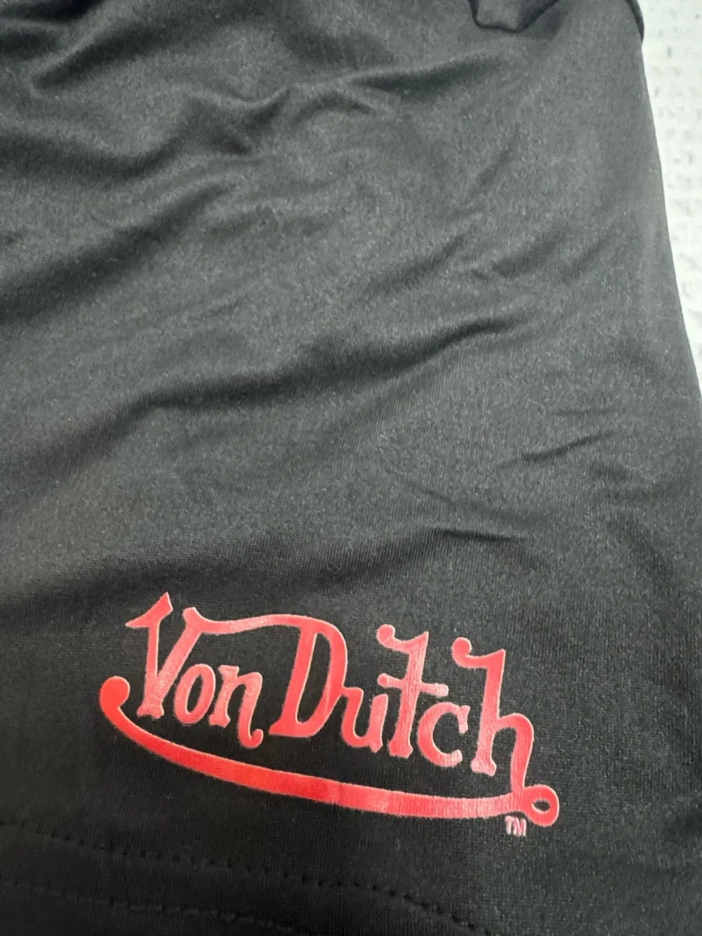 Von Dutch Black Tee with Yellow-Red Flame Wing Graphic